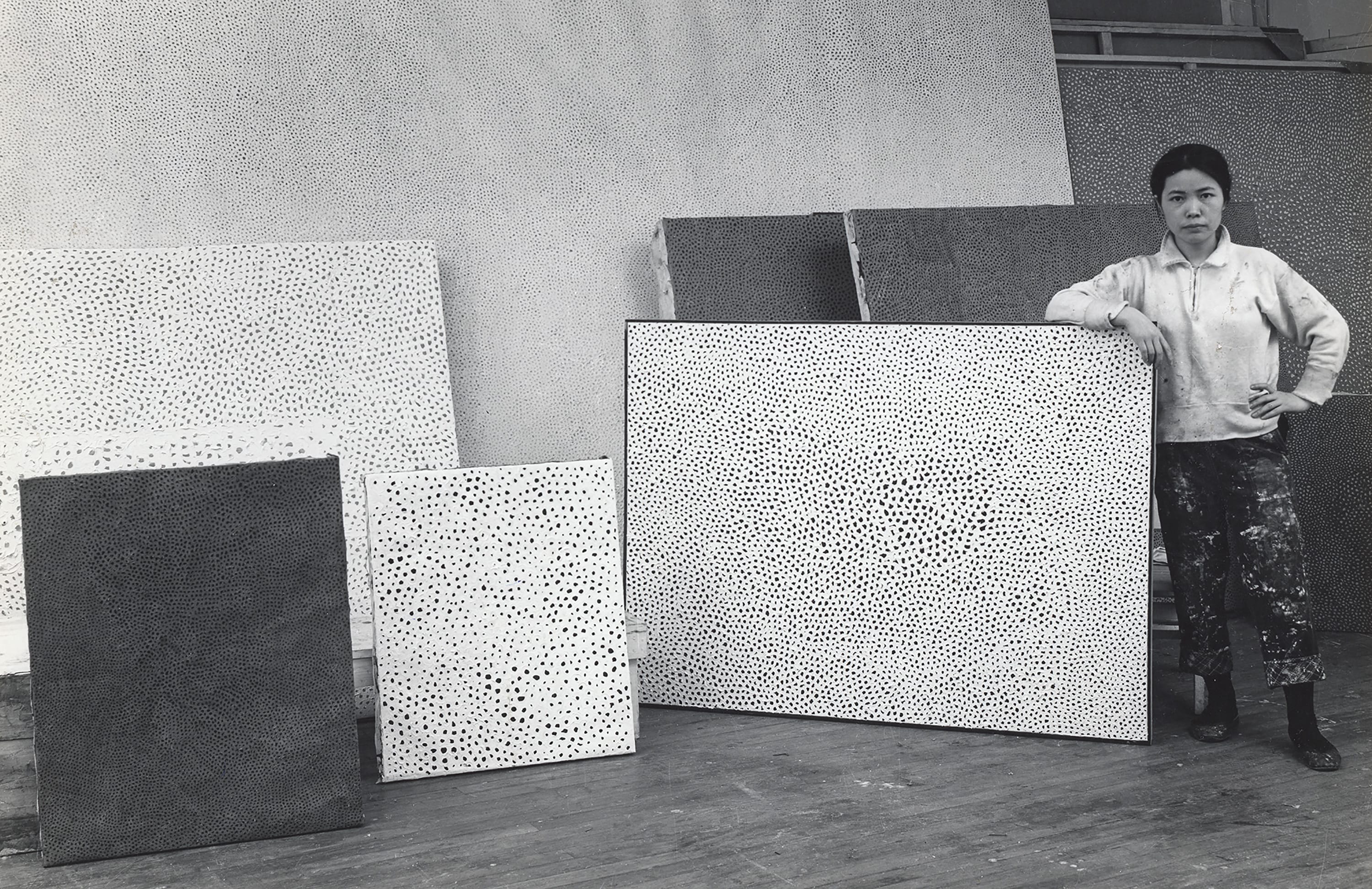 Kusama with her Infinity Net Paintings at her studio, New York, c. 1960