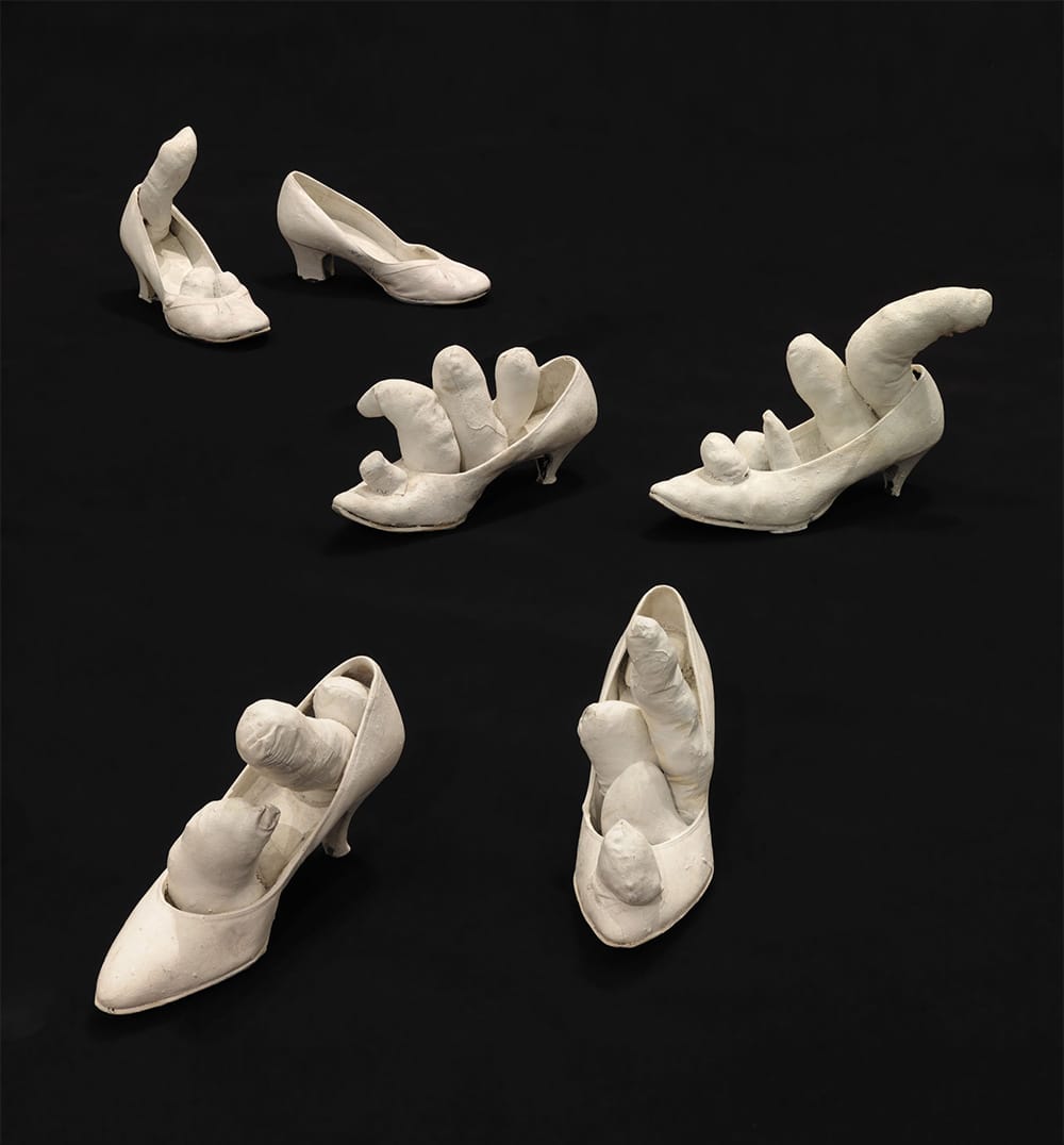 Untitled Accumulation, 1962–1963, mixed media, 10 pairs of high-heeled shoes, stuffed fabric forms and white paint, variable dimensions